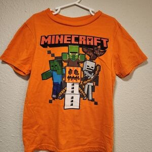 Vibrant Orange Short Sleeve Tees with Pixelated Graphics